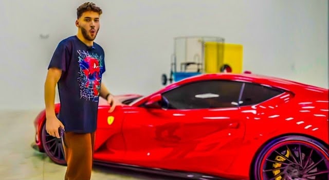Adin Ross and his Ferrari